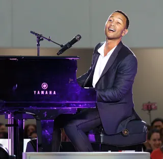 On the Keys - John Legend gave a surprise performance to shoppers on the grand opening day of Westfield WTC (World Trade Center) Mall in New York City. (Photo: Guillermo, PacificCoastNews)