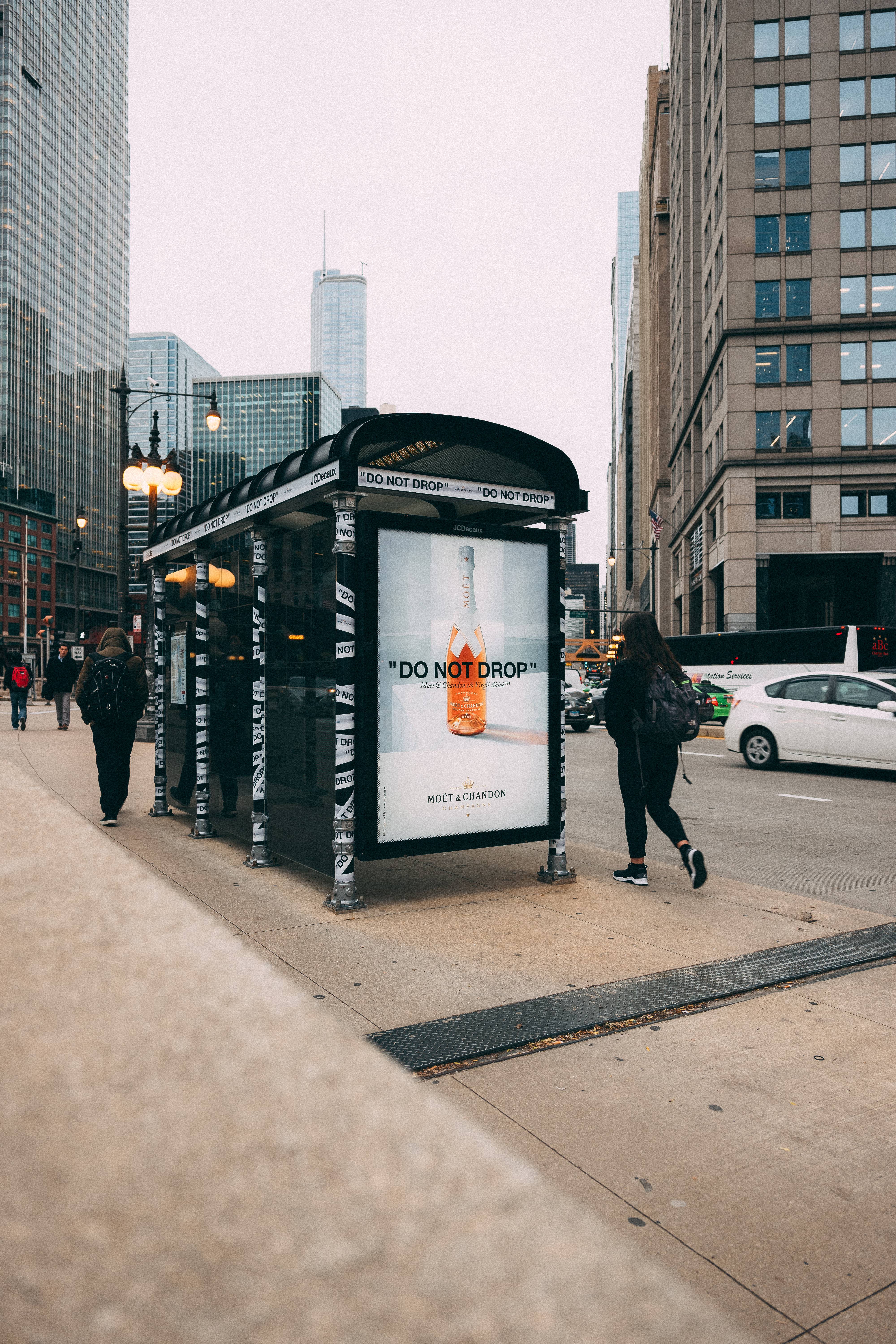 Cheers!: Designer Virgil Abloh Takes Over Chicago Bus Stops With His New  Champagne Bottle Design, News
