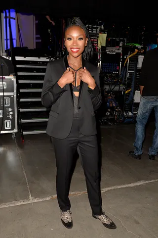 Showtime - Brandy is all smiles before she gets ready to blaze the stage.&nbsp;(Photo: Earl Gibson/BET/Getty Images for BET)