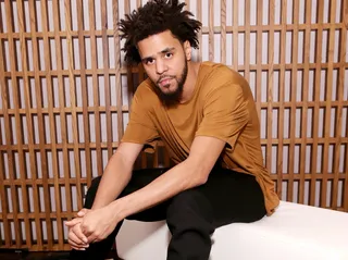 J. Cole - J. Cole proved he's a one-man-band man with his third studio album, 2014 Forest Hills Drive, which features no guest appearances and minimal help on the boards. Cole held his own for dolo on the production end, from the haunting "January 28th" to the chipmunk soul of "Wet Dreamz." (Photo: Neilson Barnard/Getty Images for BALLY).