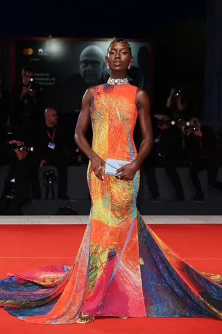 090222-style-gorgeous-jodie-turner-smith-wears-a-colorful-lace-gown-to-commands-attention-at-the-2022-venice-film-festival.jpg