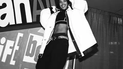 NEW YORK - OCTOBER 5:  American R&B singer Aaliyah, aka Aaliyah Dana Houghton (1979-2001) poses for a photo backstage at Madison Square Garden for Lifebeat's Urban Aid benefit concert on October 5, 1995 in New York City, New York.  (Photo by Catherine McGann/Getty Images)