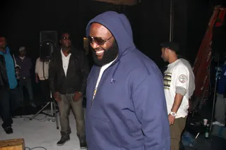 Laughing At You Haters - Rick Ross is usually all business when it comes to music, but on the set of DJ Khaled's "Welcome to My Hood (Remix)" video shoot in New York City on March 29, 2011, the Bawse has a moment of levity.(Photo: Walik Goshorn for BET Digital)