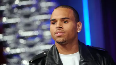 Chris Brown lashing out at photographers\r&nbsp; - &quot;Y'all n---as is weak. Did you call them to try and film me? Y'all n---as is gay!&quot;\r&nbsp;(Photo: Brad Barket/PictureGroup)