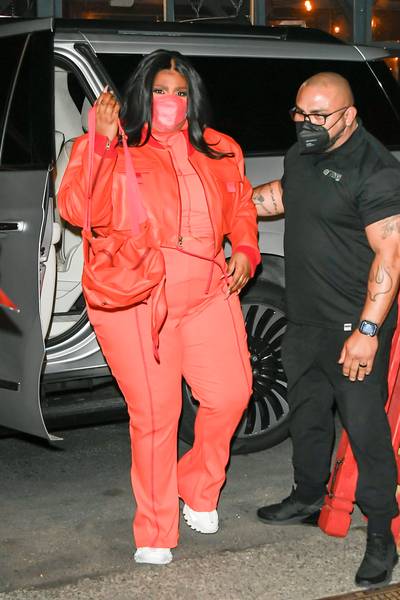 041322-style-lizzo-snl-host-rehearsal-orange-outfit.jpg