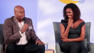 Michelle Obama and Craig Robinson on BET Buzz 2020.
