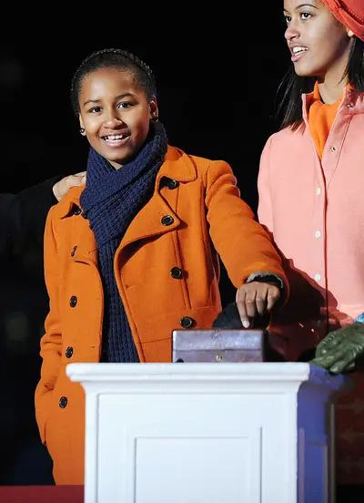 Light Up the Tree - The Obama girls lit the 90th National Christmas Tree at the White House in 2012. (Photo: Olivier Douliery-Pool/Getty Images)