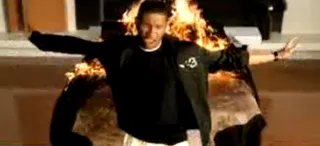 Usher, “Burn” - Usher finds himself missing his boo as his heart burns after the loss of an ex-love. The video’s effects include a swimming pool on fire as well as a huge mural and palm trees engulfed in flames.&nbsp;&nbsp;(Photo: Arista Records)