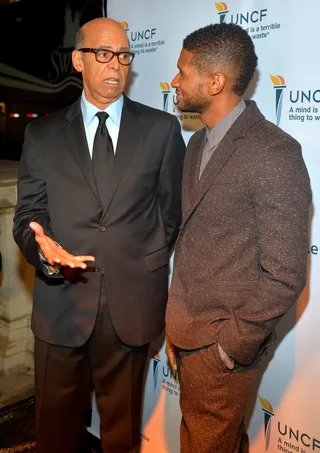 In Charge - UNCF President Dr. Michael Lomax and Usher coming together for education. (Photo: Charley Gallay/Getty Images for BET)