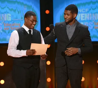 Usher Gives Back - Usher gets to know UNCF Rising Star Ammon Lyle. (Photo: Mark Davis/Getty Images for BET)