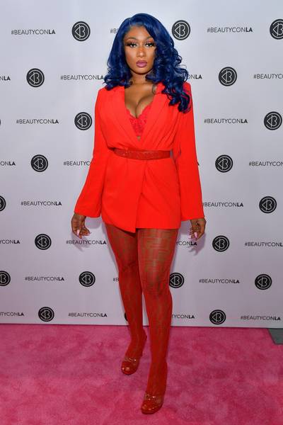Red Hot Hottie - Meg was dressed to impress at BeautyCon LA 2019. Styled by E.J. King, sis hit the carpet in an all red look of an oversized, PraVana Couture blazer jacket, sheer Fendi tights with a Chanel belt sinching her waist. (Photo: Matt Winkelmeyer/Getty Images)&nbsp;