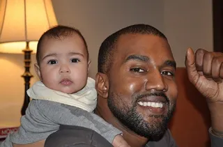 Kim Kardashian @kimkardashian - Littlle North West latches on to her daddy's back and&nbsp;Kanye is all smiles as he spends some quality time with his sweet baby girl. Kim Kardashian shared this flick and more with Ellen DeGeneres on her talk show this week.(Photo: Kim Kardashian via Instagram)