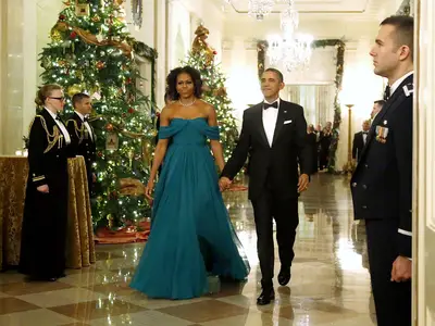 Emerald Love - The president and first lady arrive at a reception for the Kennedy Center Honors in December 2013.&nbsp;(Photo: REUTERS/Jonathan Ernst) &nbsp;