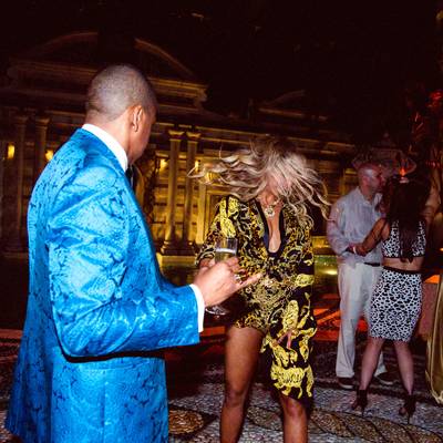 Look Back at It - Looking dapper in cobalt blue, Hov took a minute to admire his wifey’s signature moves. The power couple rang in 2014 with a star-studded New Year’s bash at the Versace mansion in Miami.   (photo: iam.beyonce via Tumblr)&nbsp;