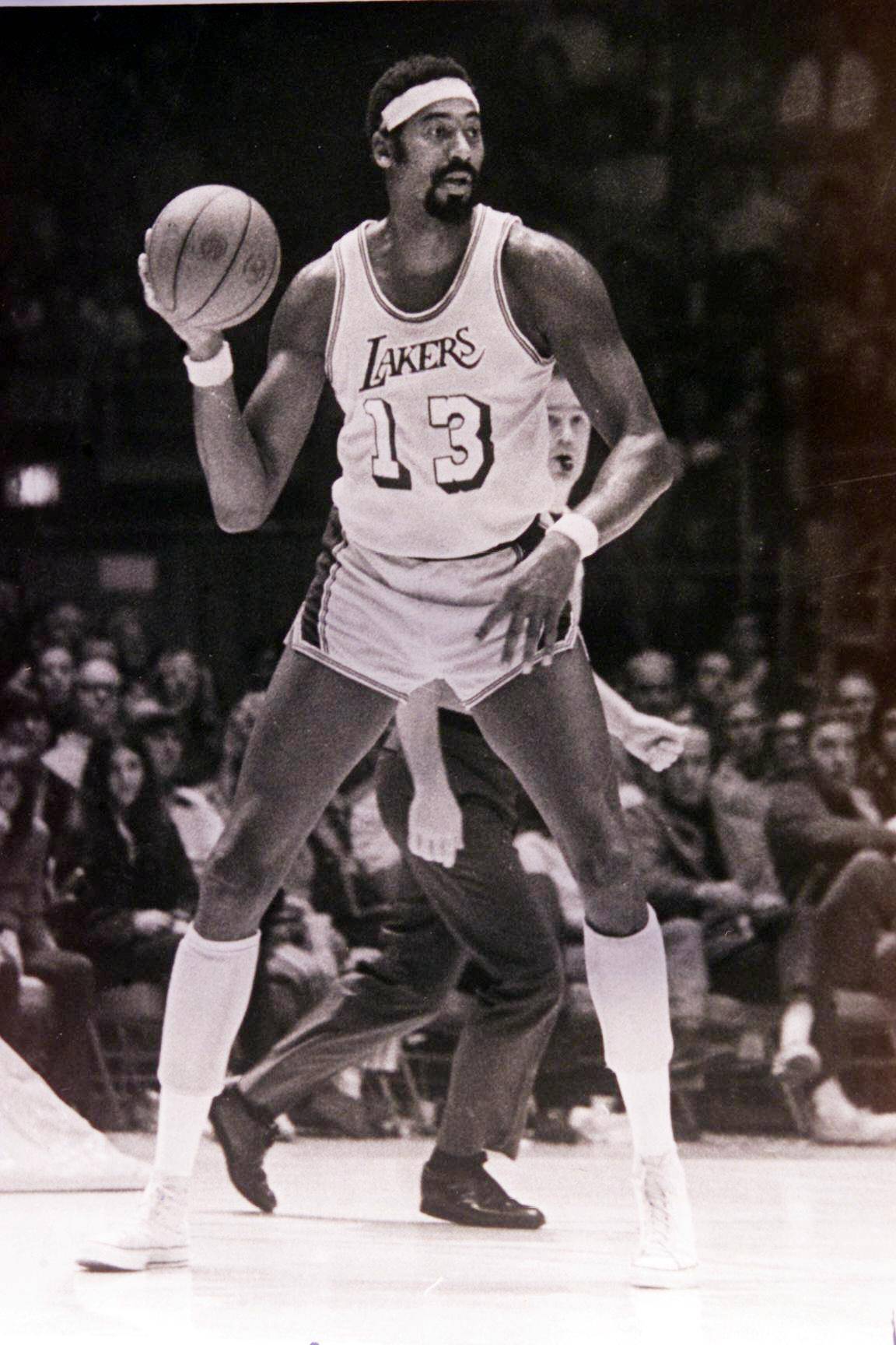 Wilt Chamberlain - NBA legend Wilt “The Stilt” Chamberlain is credited as one of the originators of the sporty look in the 1960s and '70s.&nbsp; (Photo: Kevin C. Cox/Getty Images)