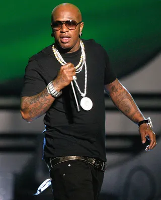 Birdman (@BIRDMAN5STAR) - TWEET: “Livin Legend. YMCMB. Congrats 2.BMJRMakin HISTORY.C4.#Dont LIE. New ERA,in Music. We Tha Busine$” A week after predicting that Wayne would sell a million copies of the Carter IV in it’s first week, Birdman congratulates him on nearly reaching that mark. (Photo: Kevin Winter/Getty Images)