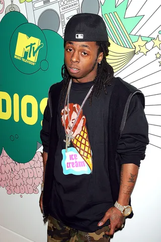 Lil Wayne - @LilTunechi: Remembering those we lost on this unforgettable day. God bless their families and may their souls rest in peace.(Photo: Scott Gries/Getty Images)