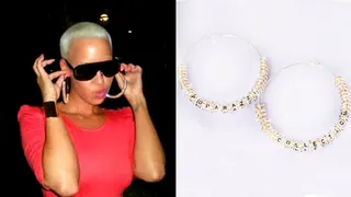 Amber Rose - The social butterfly shows off her ear candy with POParazzi's notorious &quot;AmBurrr Alert.&quot;(Photo: Courtesy of Poparazzi)