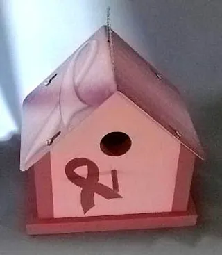 Bird House - A decorative bird house gets decked out for Breast Cancer Awareness Month.&nbsp;(Photo: thestreetdept.com)