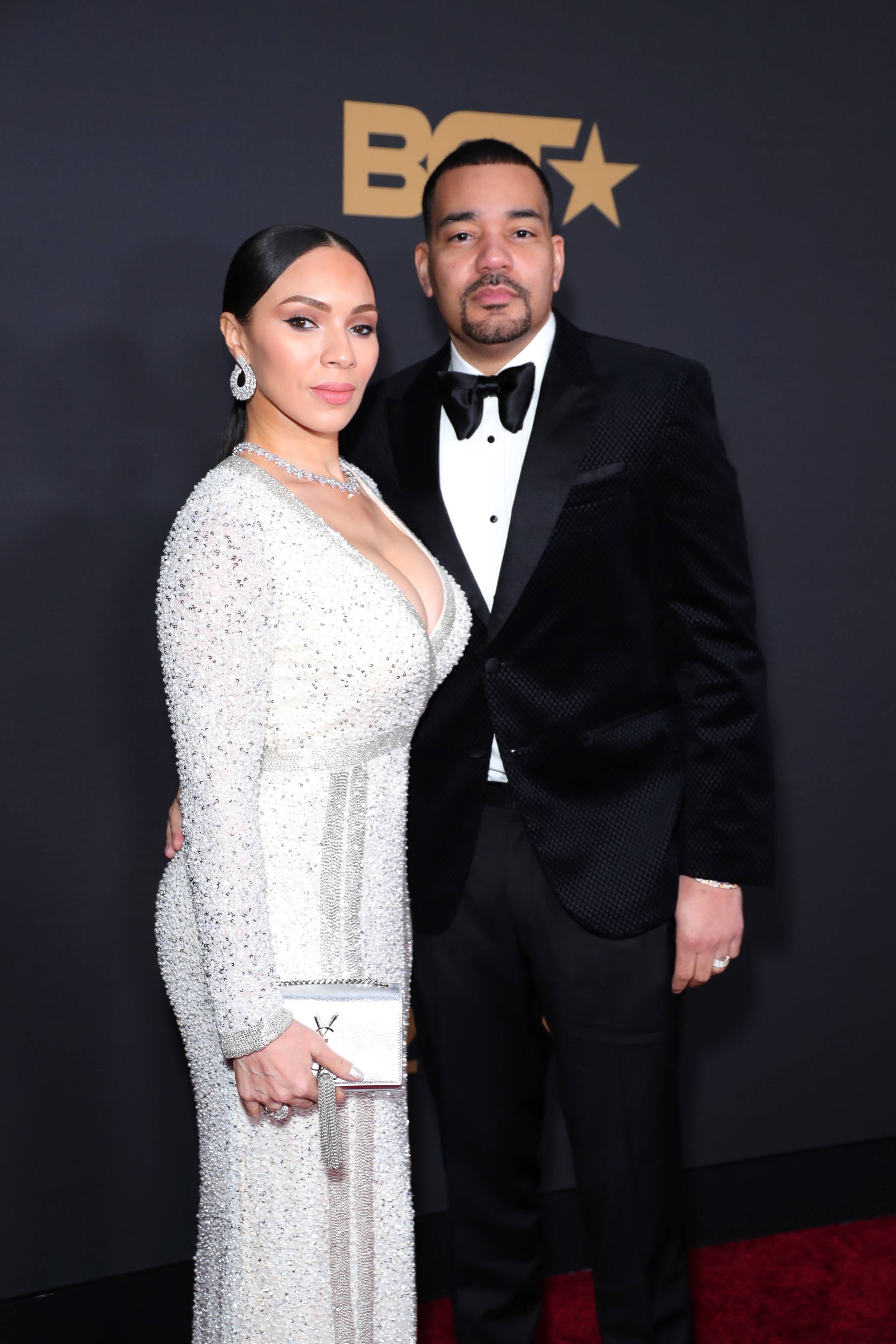 Gia Casey with husband DJ Envy. - (Photo by Leon Bennett/Getty Images for BET)