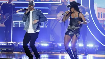 Walker Hayes and Ciara perform onstage during the 2022 CMT Artists of the Year (Photo by Jason Kempin/Getty Images for CMT)