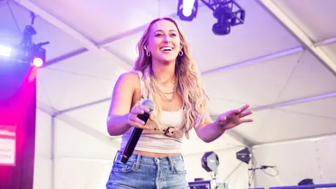 BROOKLYN, MICHIGAN - JULY 24: Ashley Cooke performs during 2022 Faster Horses Festival at Michigan International Speedway on July 24, 2022 in Brooklyn, Michigan.