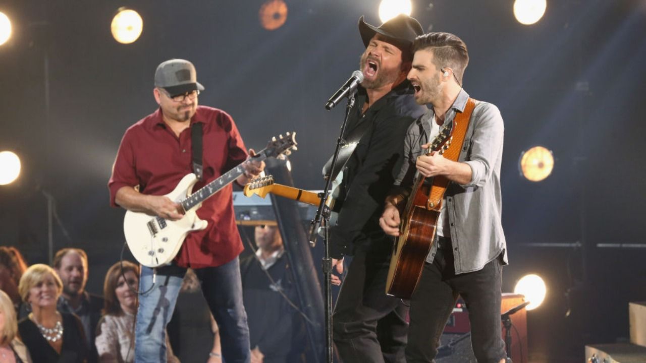 Watch: Garth Brooks Makes Mitch Rossell Fight Tears With Surprise Opry ...