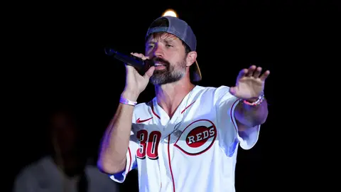DYERSVILLE, OH - AUGUST 11: Walker Hayes performs after the game between the Chicago Cubs and the Cincinnati Reds at The MLB Field at Field of Dreams on Thursday, August 11, 2022 in Dyersville, Iowa. 
