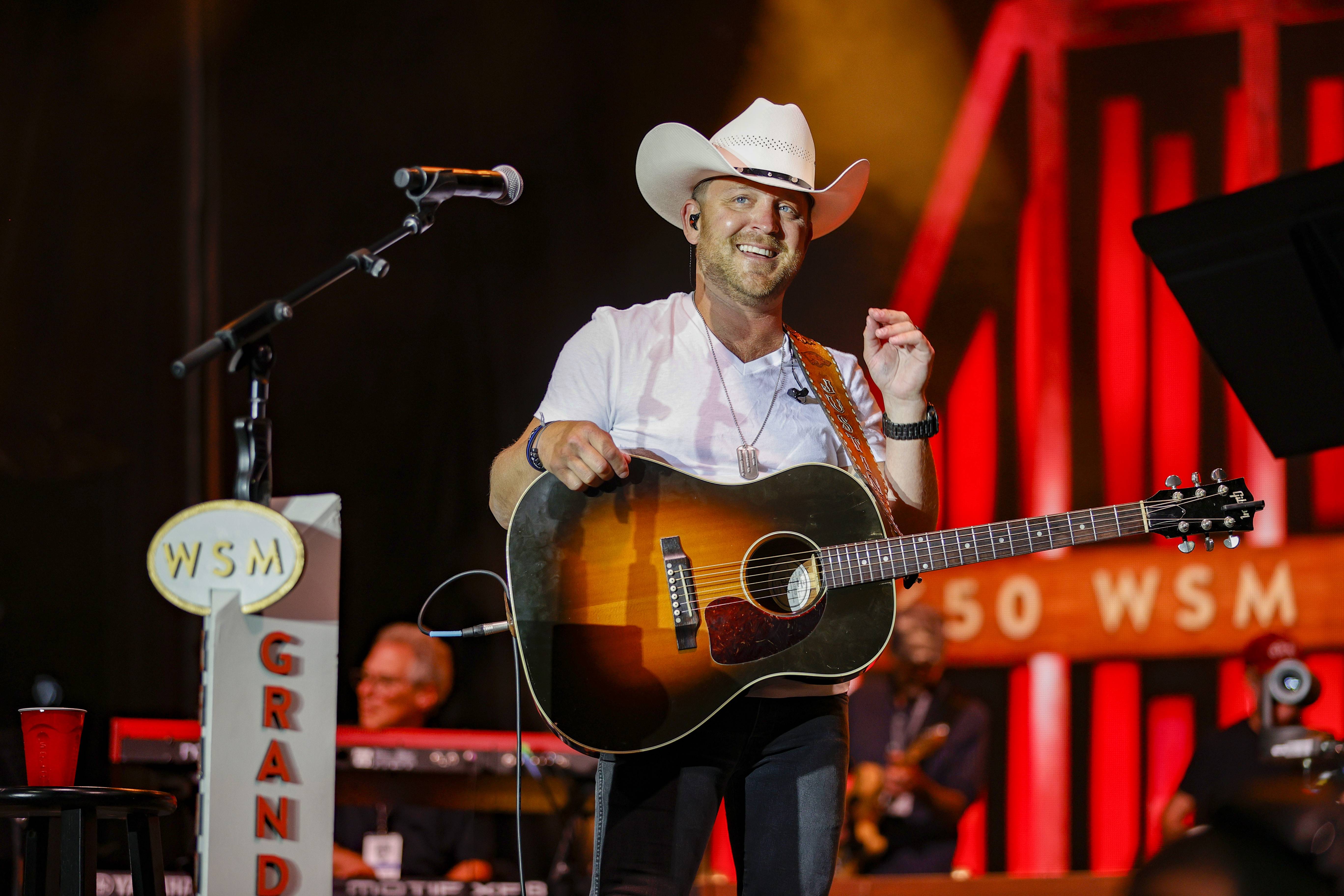 NASHVILLE, TENNESSEE - AUGUST 08: Justin Moore performs onstage during the 2021 Big Machine Music City Grand Prix on August 08, 2021 in Nashville, Tennessee. 