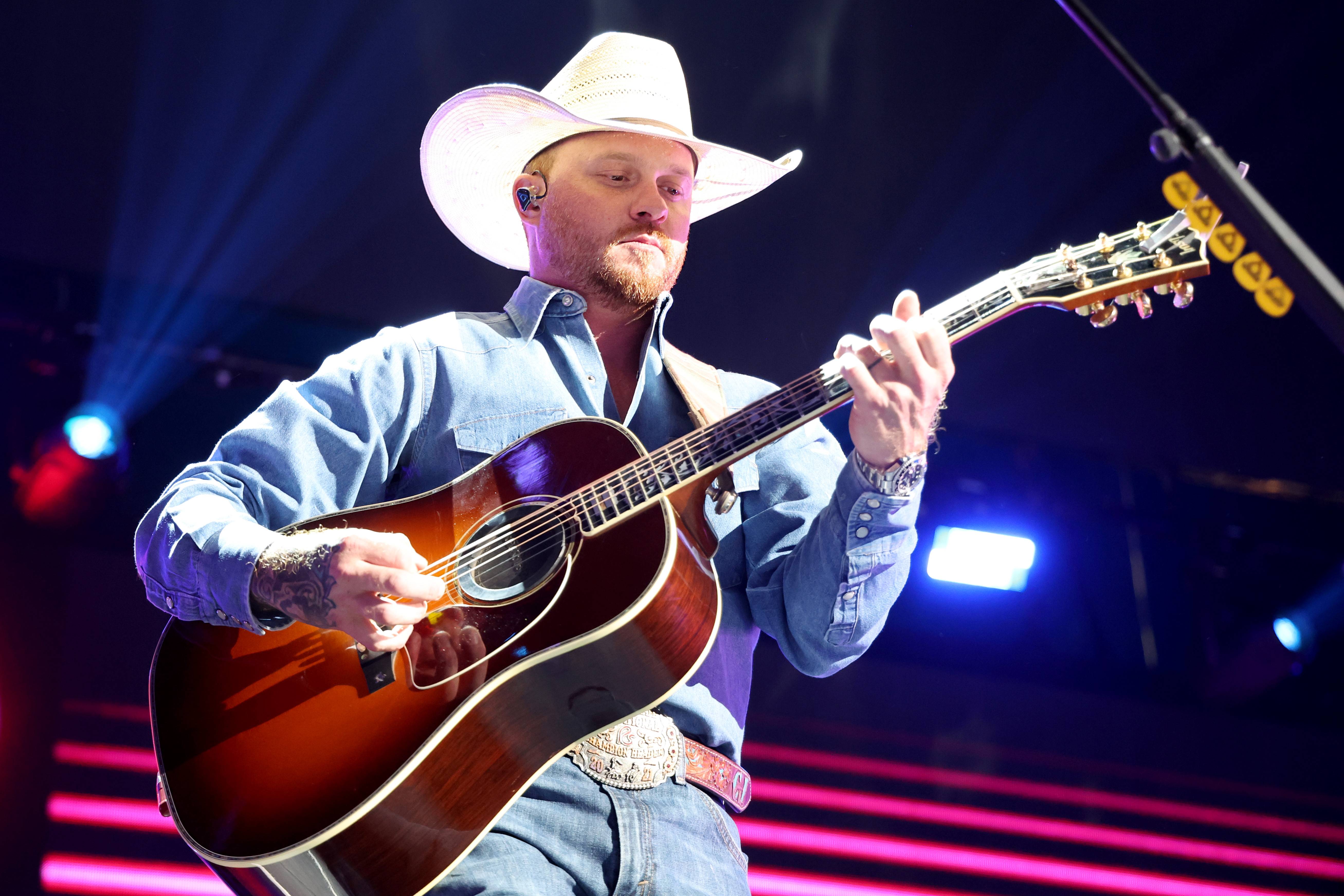 AUSTIN, TEXAS - MAY 07: (EDITORIAL USE ONLY) Cody Johnson performs onstage during the 2022 iHeartCountry Festival presented by Capital One at the new state-of-the-art venue Moody Center on May 7, 2022 in Austin, Texas. 