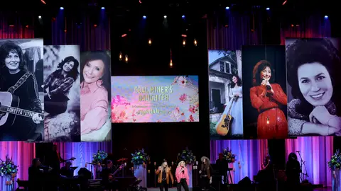 NASHVILLE, TENNESSEE - OCTOBER 30: (L-R) Presley Tanita Tucker, Tanya Tucker and Layla Tucker perform onstage for CMT Coal Miner's Daughter: A Celebration of the Life & Music of Loretta Lynn at Grand Ole Opry on October 30, 2022 in Nashville, Tennessee.
