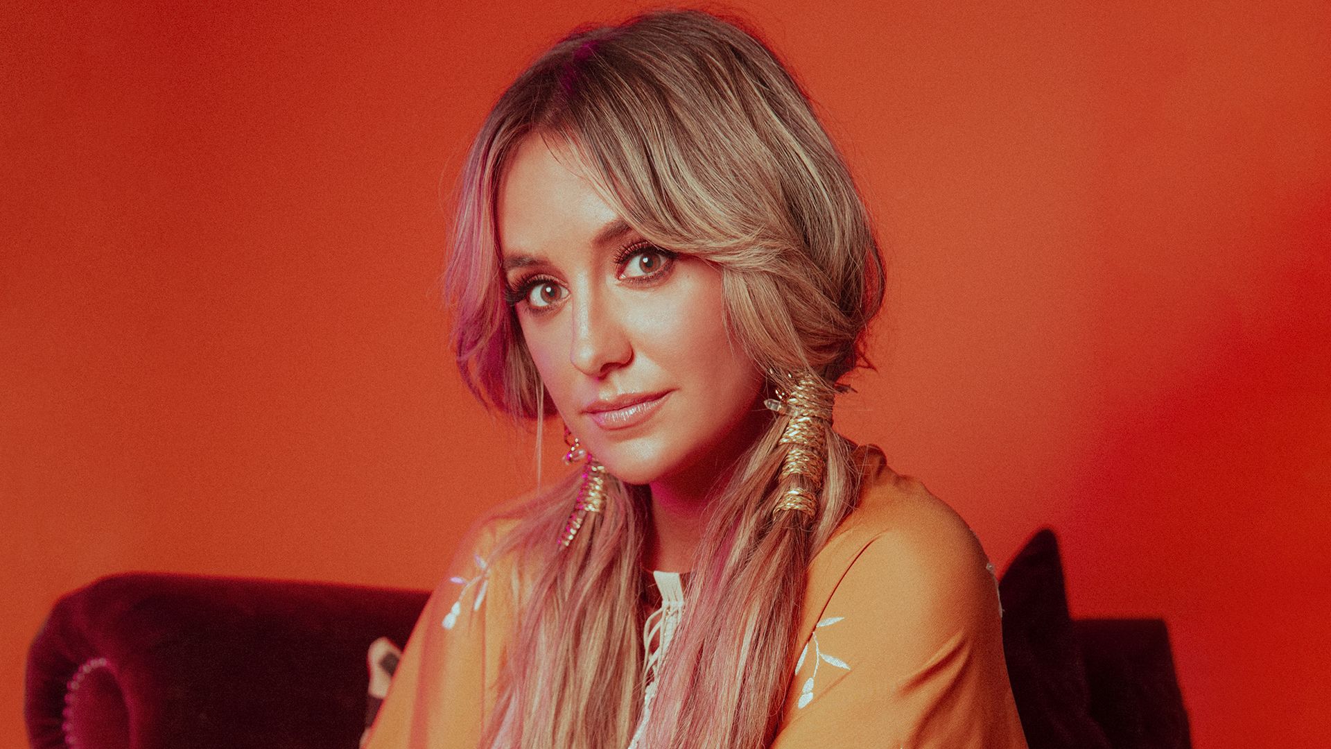 CMT ARTISTS OF THE YEAR Lainey Wilson Honored As Breakout Artist of