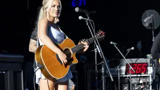 STERLING HEIGHTS, MICHIGAN - SEPTEMBER 09: Megan Moroney performs at Michigan Lottery Amphitheatre on September 09, 2022 in Sterling Heights, Michigan. 
