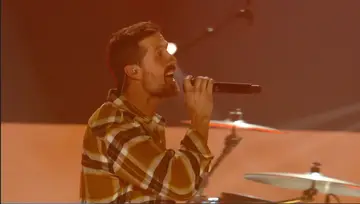 Singer-songwriter Walker Hayes performs his reflective song "AA" at the CMT Music Awards 2022.