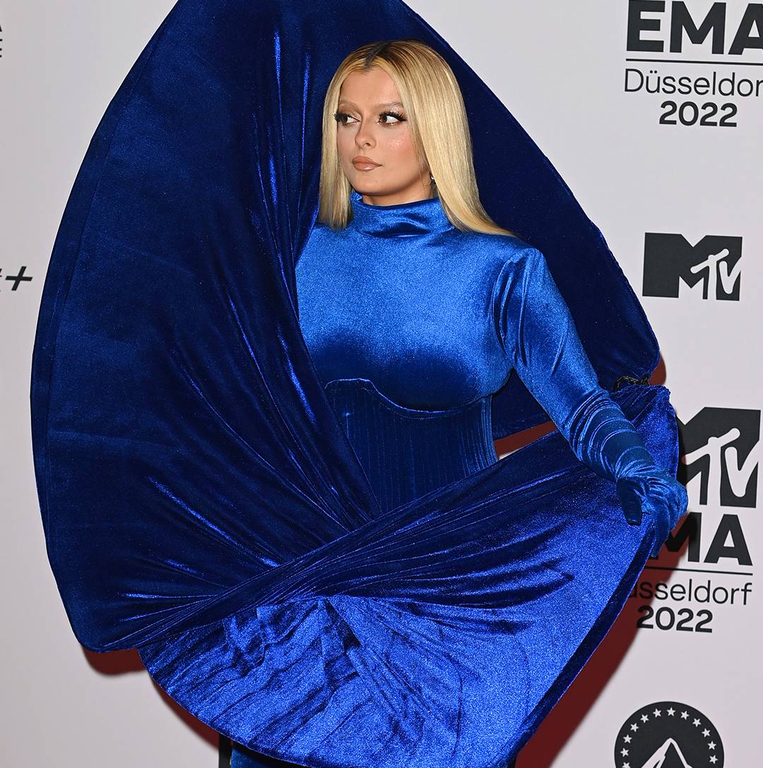 Bebe Rexha in a blue dress.