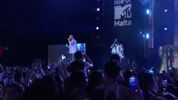 French Montana performing on stage at Isle of MTV Malta 2022, in a purple shirt.