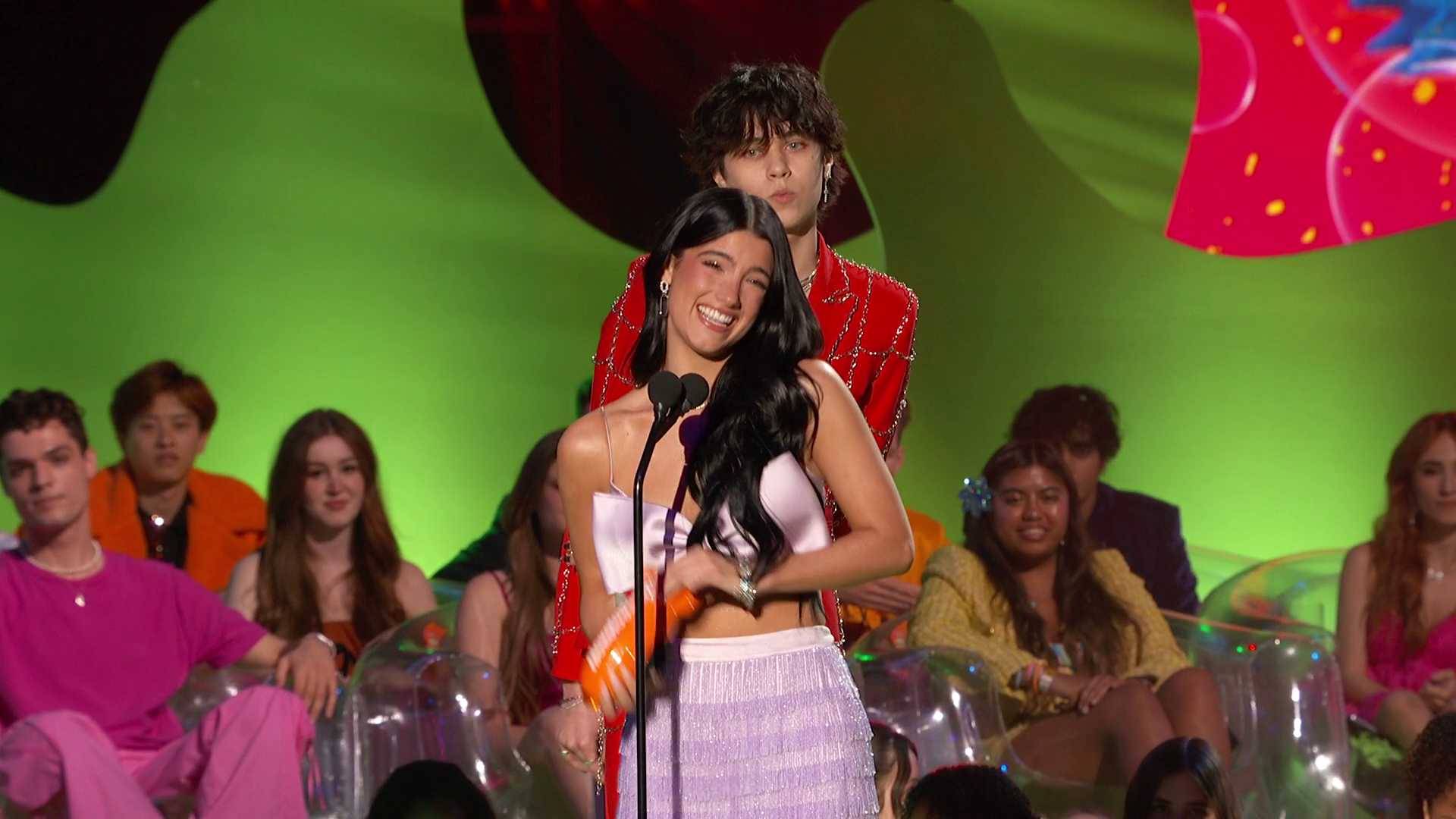 Charli accepts her third award