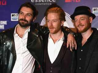mgid:file:gsp:scenic:/international/mtvema/2014/images/galleries/2014-ema-red-carpet/Simon-Neil-Ben-Johnston-James-Johnston-458697578.jpg