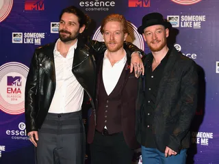 mgid:file:gsp:scenic:/international/mtvema/2014/images/galleries/2014-ema-red-carpet/Simon-Neil-Ben-Johnston-James-Johnston-458697572.jpg