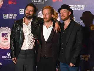 mgid:file:gsp:scenic:/international/mtvema/2014/images/galleries/2014-ema-red-carpet/Simon-Neil-Ben-Johnston-James-Johnston--458698028.jpg