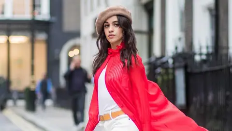 Camila Cabello wearing red kimono Ulyana Sergeenko, white pants, brown beret, red Stuart Weitzman boots is seen on October 18, 2017 in London