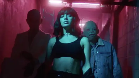 Charli XCX in the music video for 'Dirty Sexy Money'