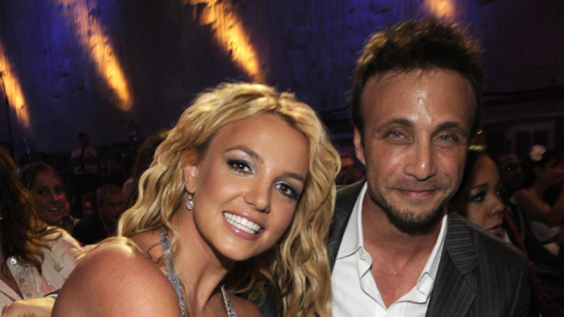 Britney Spears posing with Larry Rudolph At MTV VMAs 2008