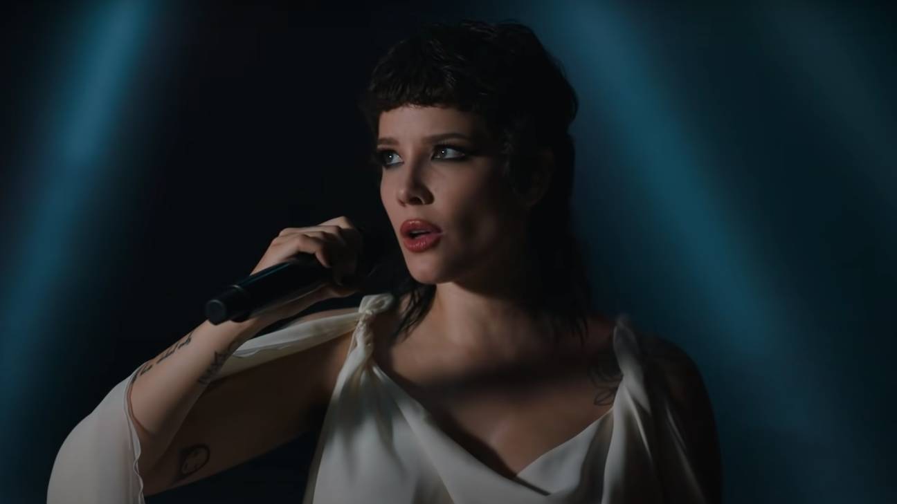 im not a woman im a god halsey in live music video with microphone