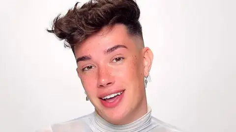James Charles Open Conversation video backlash to sexting smiling in white shirt