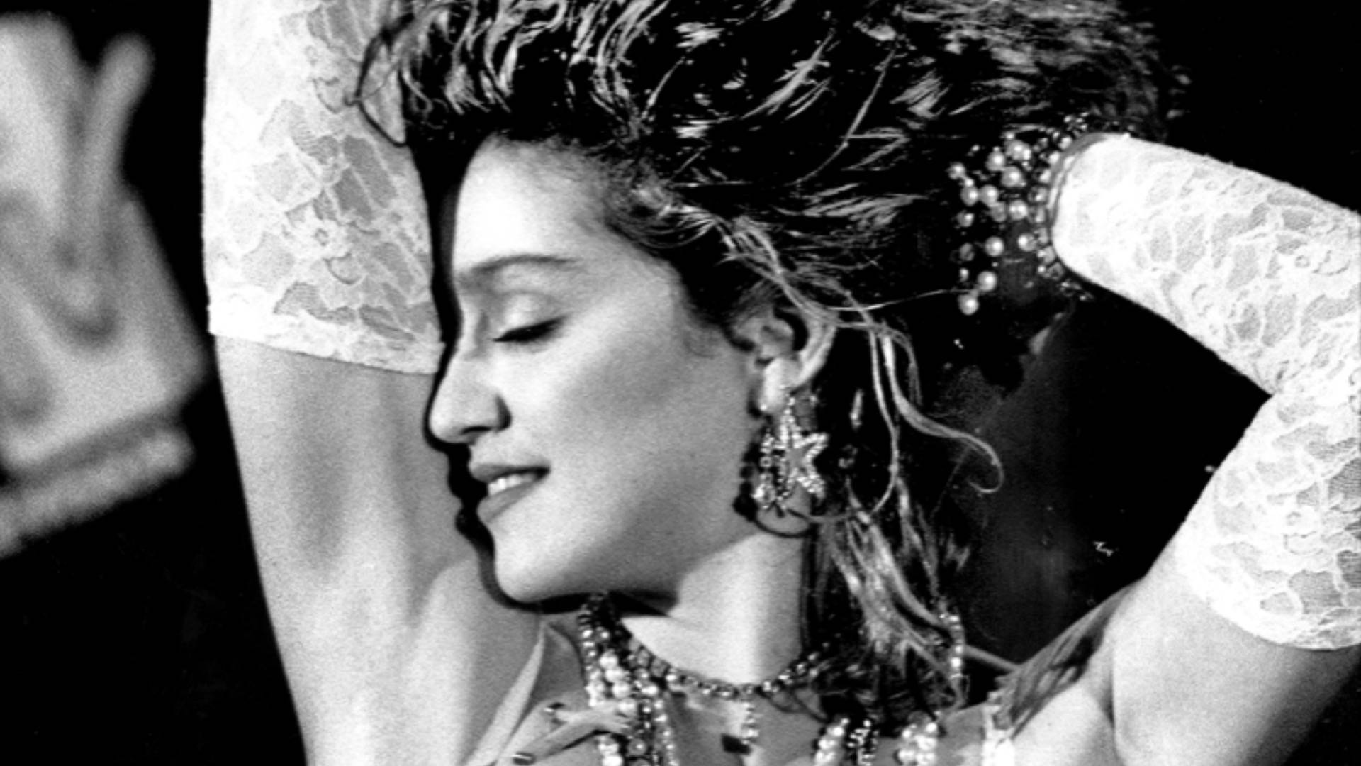 Madonna posing at MTV VMAs in 'Like A Virgin' wedding dress
