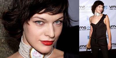 Milla Jovovich adds a regal flair to her simple black ensemble with some serious neck jewels at the 2000 VMAs.