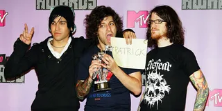 Fall Out Boy clowns Pete Wentz (host of FNMTV), Joe Trohman and Andy Hurley cover for Patrick and get fresh with a Moonman outside of the 2007 MTV Video Music Awards.