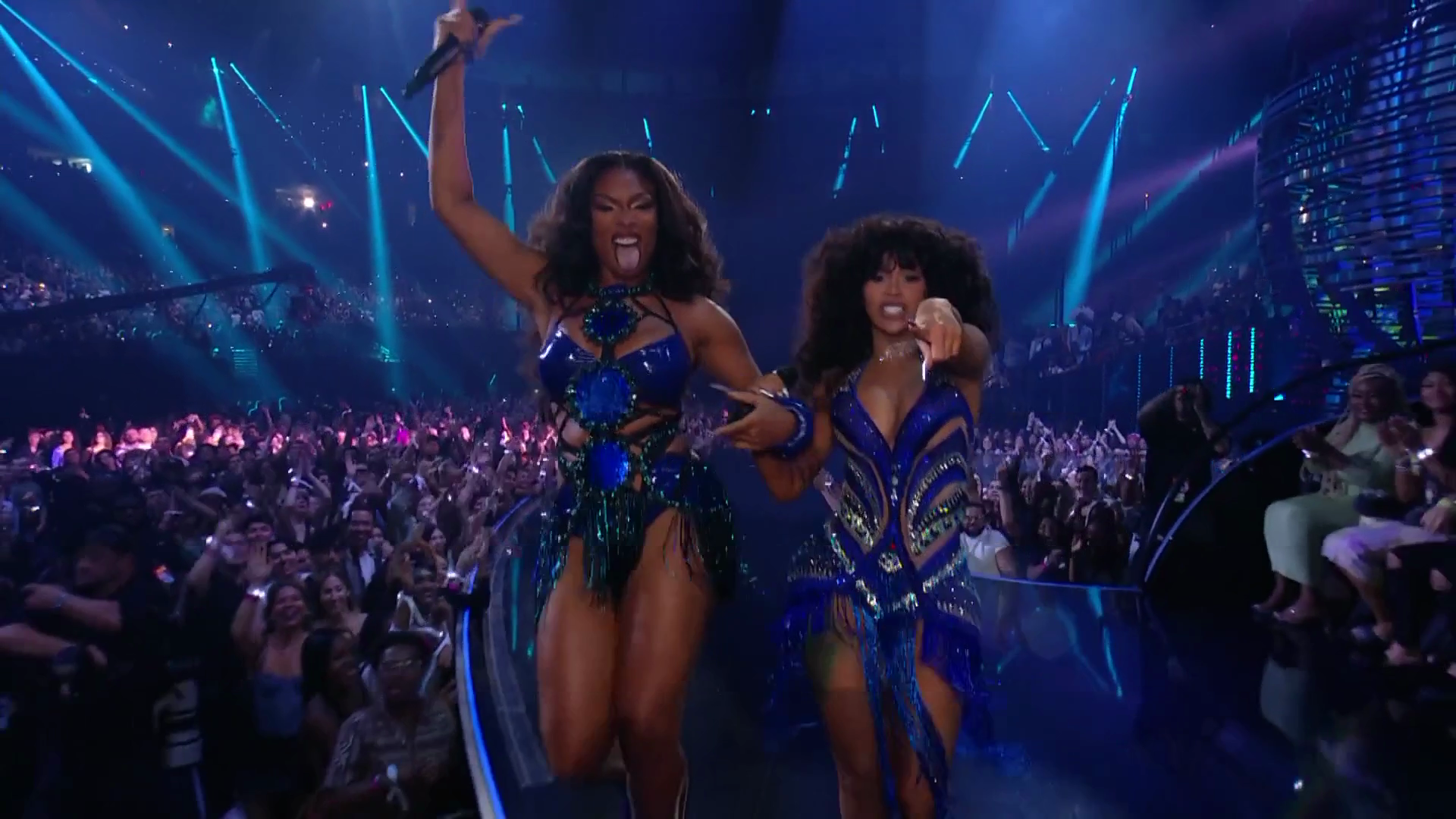 Cardi B and Megan Thee Stallion take the MTV VMAs 2023 stage to perform their track "Bongos." 