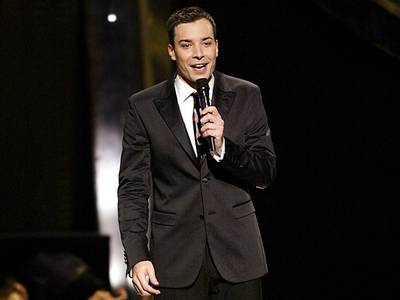 In 2002, MTV opted for the fresh-faced, boy-next-door Jimmy Fallon to host the VMAs and let guests like Triumph the Insult Comic Dog and Eminem do the insulting for him. (Getty Images)